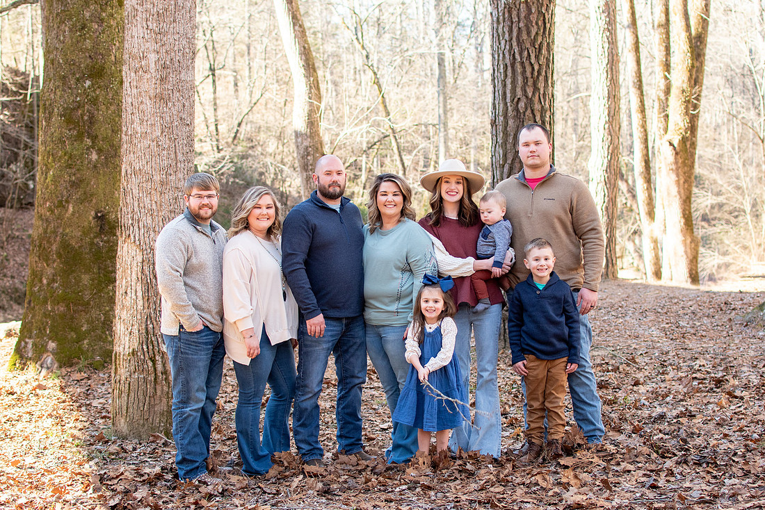 Extended family portrait in the woods