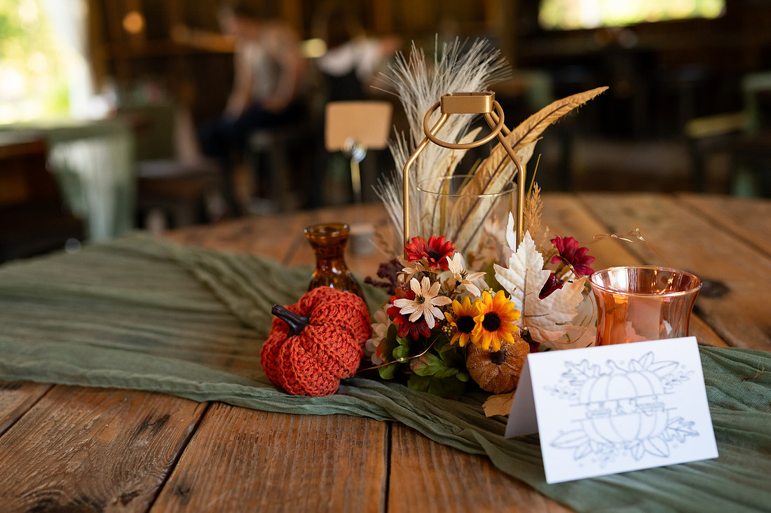 Autumn event table details and floral centerpiece